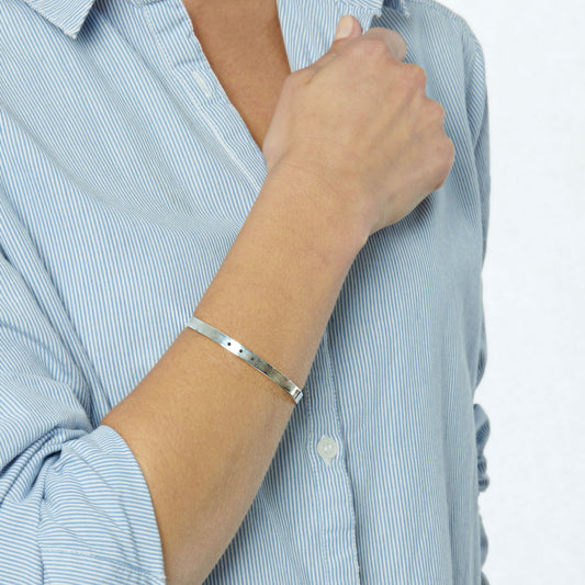 Silver claw bangle with 3 black diamonds