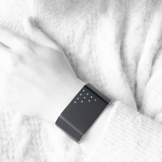 Mirus cuff with apatite diamonds and black aluminum