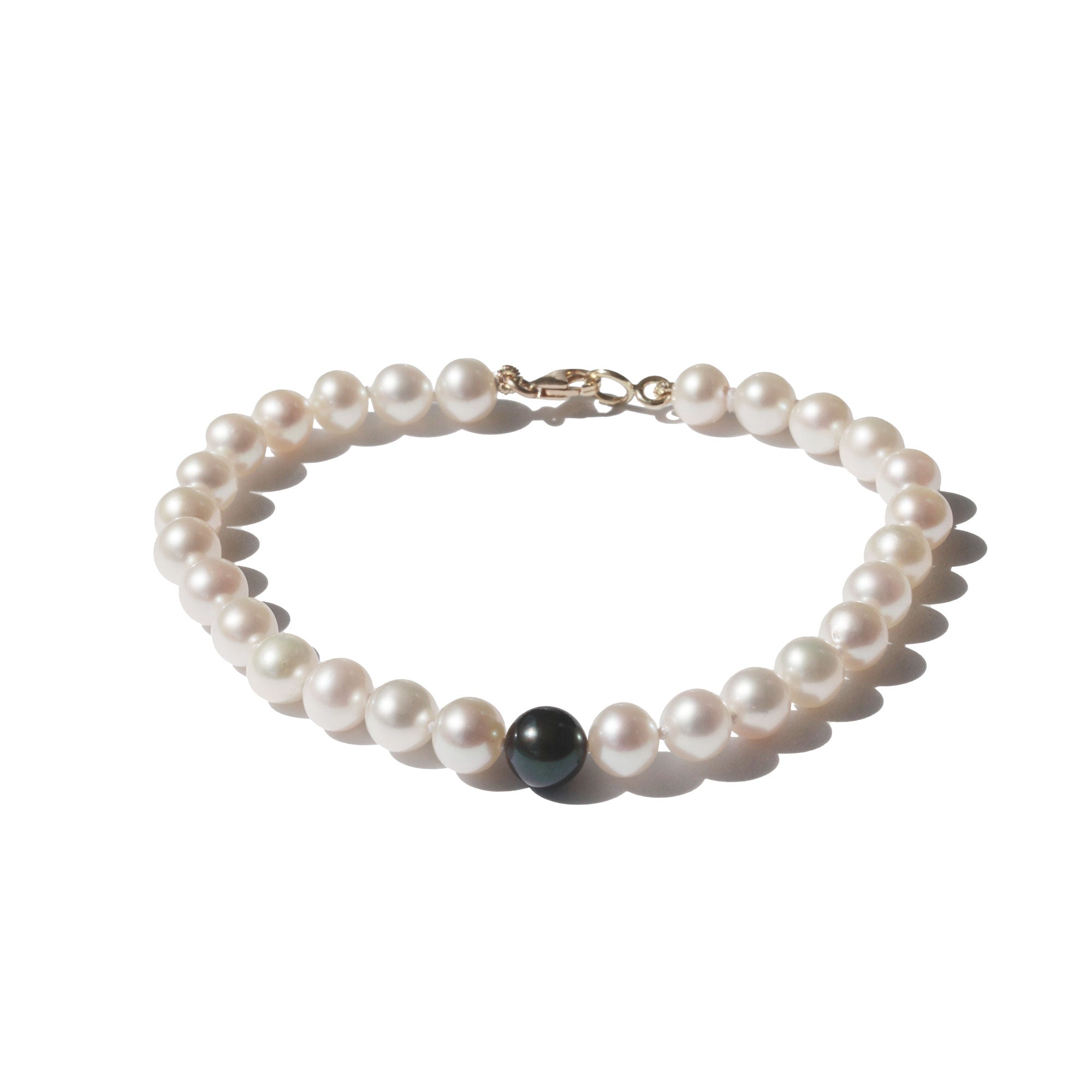 Bracelet perles blanches et noire